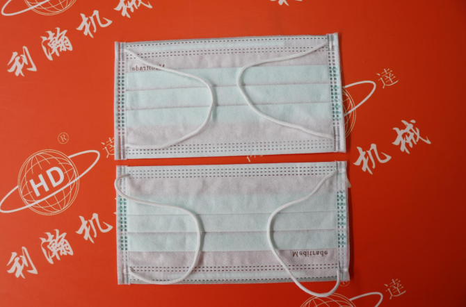 高速全電內耳包邊口罩機HD-11107 高速全電內耳包邊口罩機HD-11107